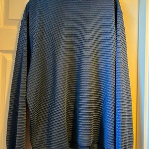 Two men’s dress shirts .. one long sleeve blue ribbed- one cream short sleeve